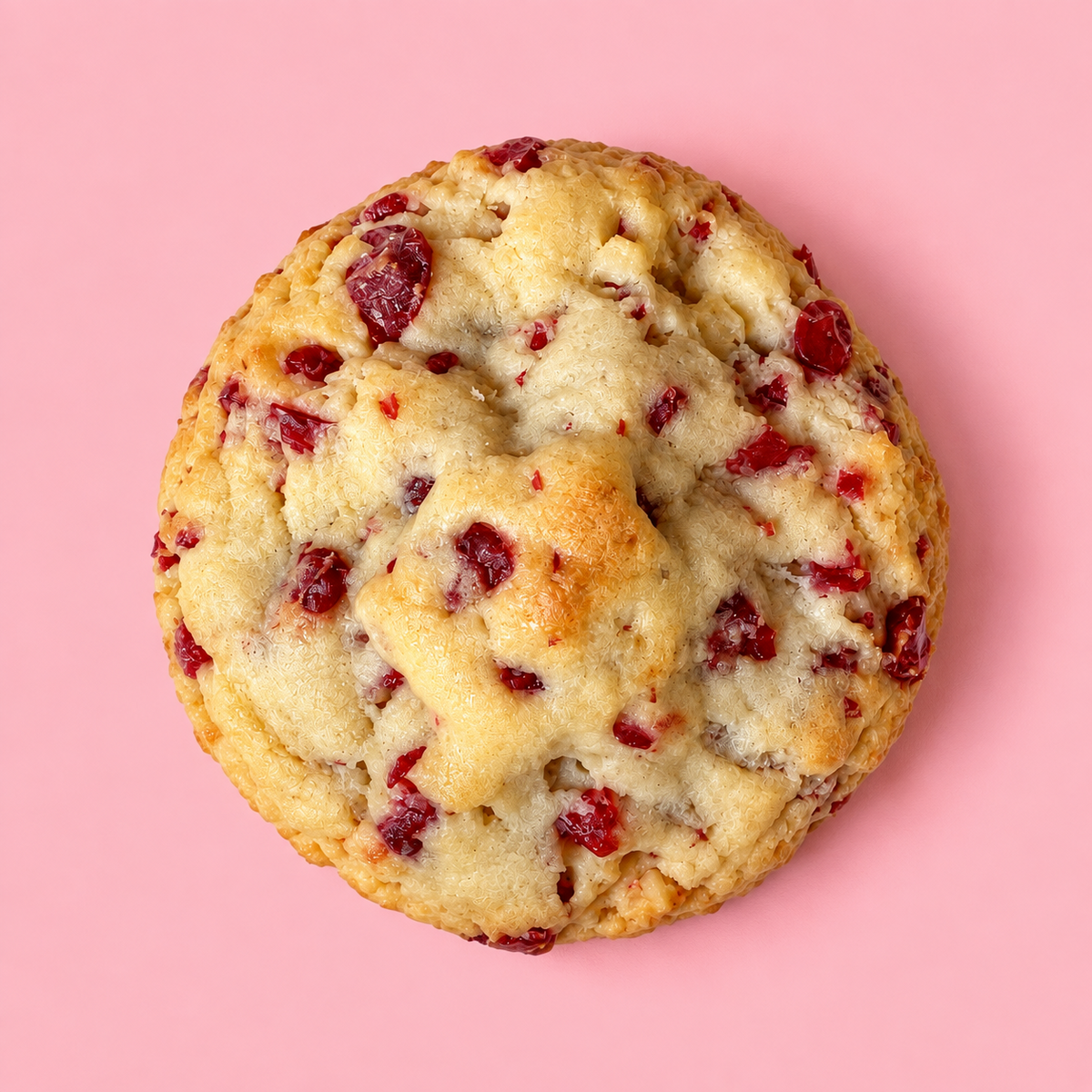 Overhead view of a Strawberry Belgian Waffle Cookie with strawberry pieces